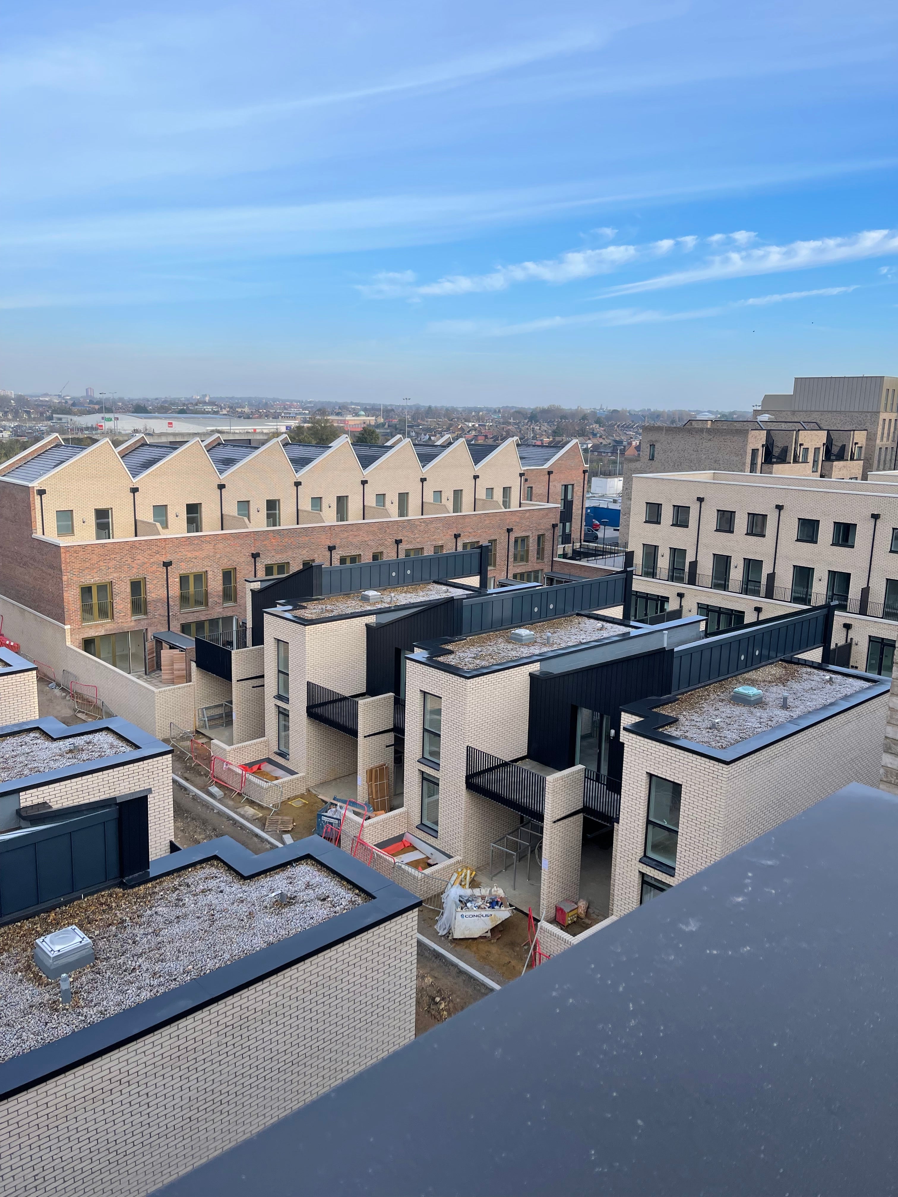 Black aluminium coping system on new residential houses